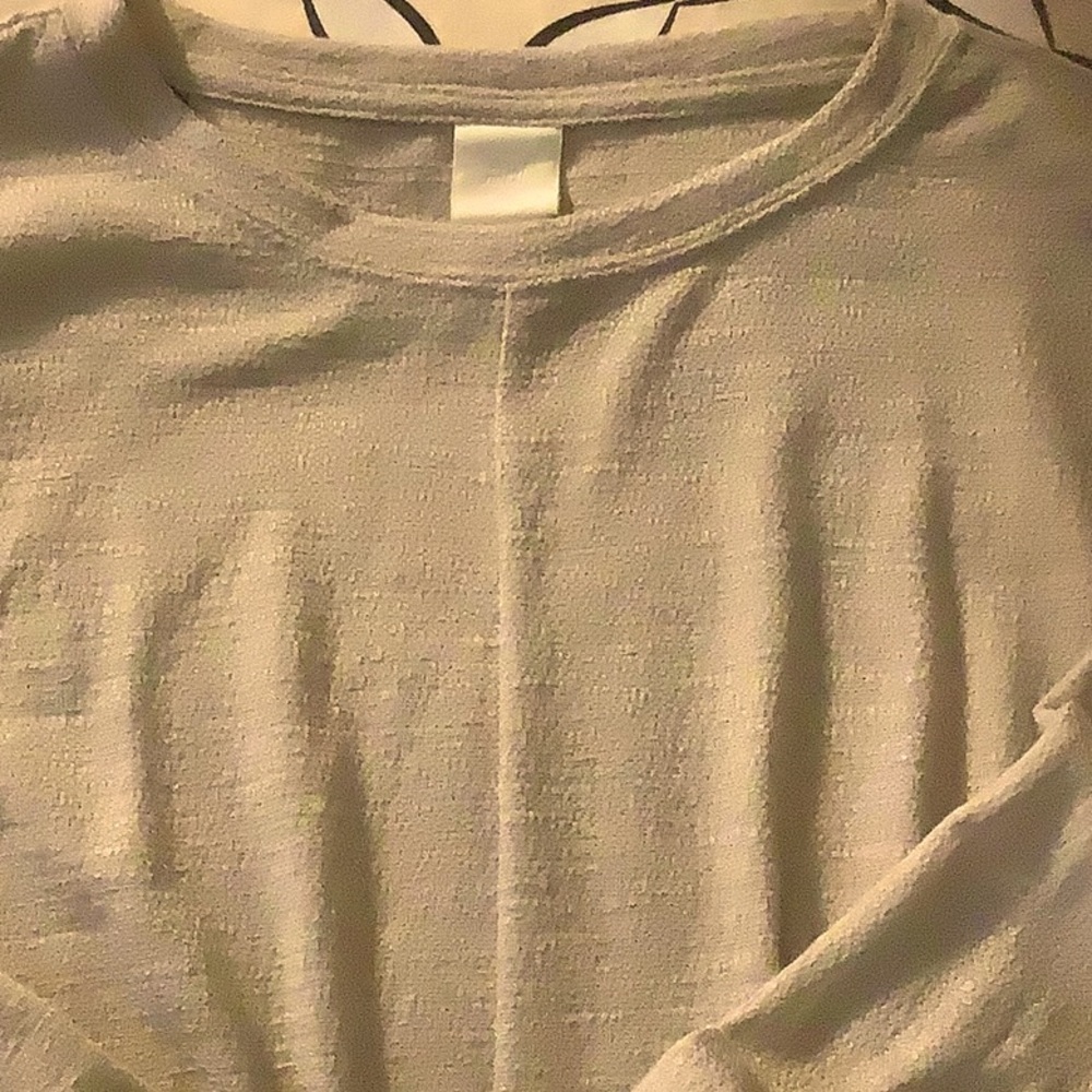 Never worn H&M women’s long sleeve top. Tie at the bottom. Size XS